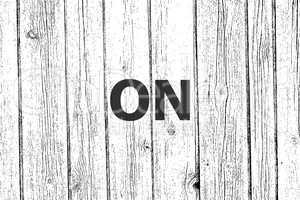 Text On. Business concept . Wooden texture background. Black and white