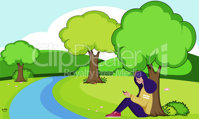 girl sitting near to the river and using phone