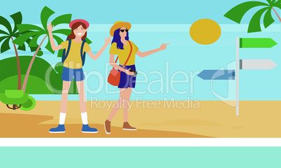 two girls are enjoying picnic on the beach