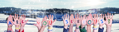 Children Hands Building Word Are You Serious, Snowy Winter Background