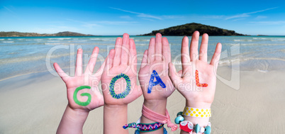 Children Hands Building Word Goal, Ocean Background