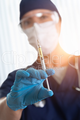 Doctor or Nurse Holding Medical Syringe with Needle