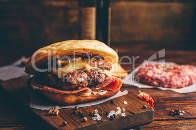 Cheeseburger on Cutting Board