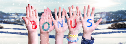 Children Hands Building Word Bonus, Snowy Winter Background