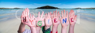 Kids Hands Holding Word Hygiene, Ocean Background