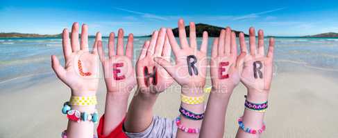 Children Hands Building Word Lehrer Means Teacher, Ocean Background