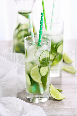 Refreshing tonic with slices of cucumber, mint, lime