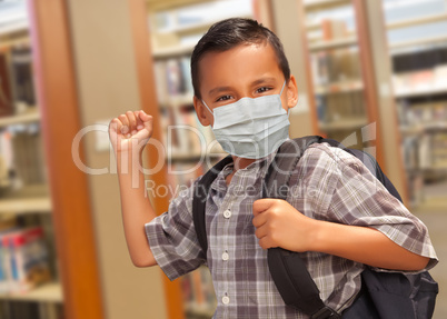 Hispanic Student Boy Wearing Face Mask with Backpack in the Libr