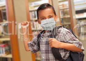 Hispanic Student Boy Wearing Face Mask with Backpack in the Libr