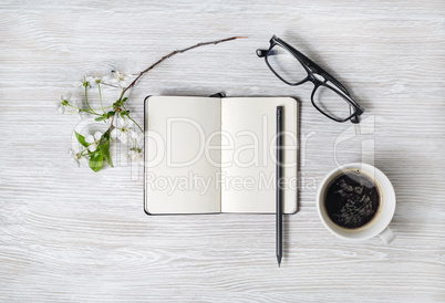 Stationery on light wood table