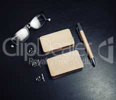 Business cards, pen, glasses