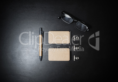 Business cards, pen and glasses