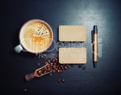 Coffee, business cards, pen