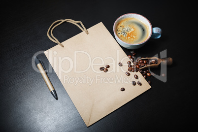 Kraft paper bag, coffee, pen