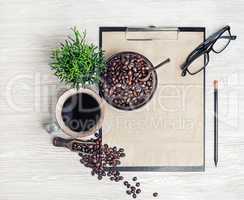 Clipboard and coffee