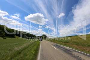 Summer landscape with green fields and beautiful sky