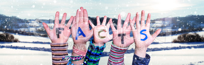 Children Hands Building Word Facts, Snowy Winter Background