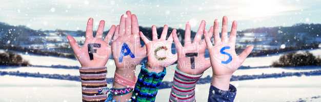 Children Hands Building Word Facts, Snowy Winter Background