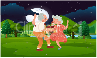 old couple dancing in the park at night