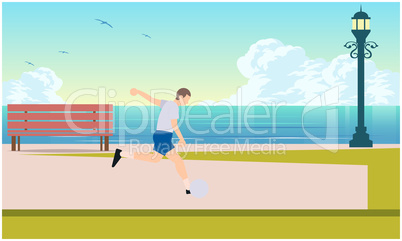 man is playing football on the beach