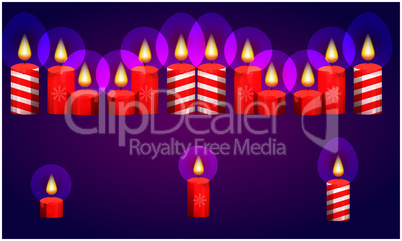 burning of various Christmas candle on abstract background
