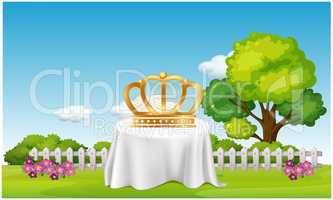 Crown is placed on a table in the garden