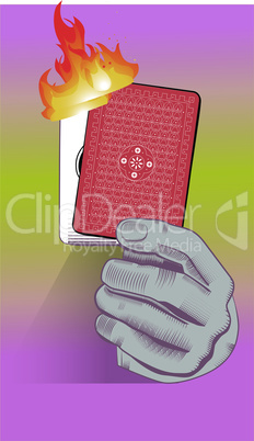 playing card is burning in hand