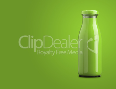 A bottle of green organic vegetable juice on a green background