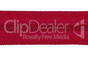 Closed red zipper isolated on white background. Red zipper for tailor sewing.