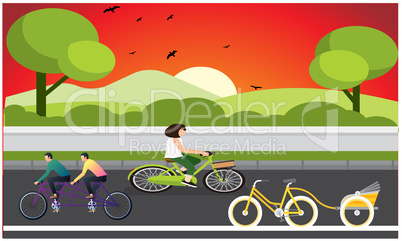 bicycle and tricycle is on road in the evening