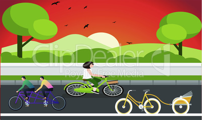 bicycle and tricycle is on road in the evening