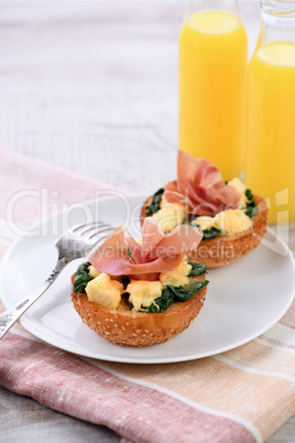 Breakfast. Bun with cheese, spinach, ham