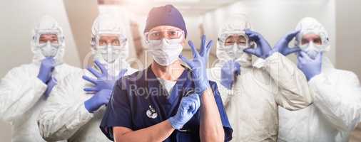 Team of Female and Male Doctors or Nurses Wearing Personal Prote