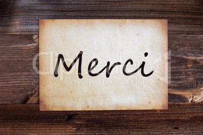 Old Paper, Merci Means Thank You, Wooden Background