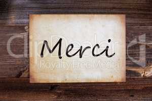 Old Paper, Merci Means Thank You, Wooden Background