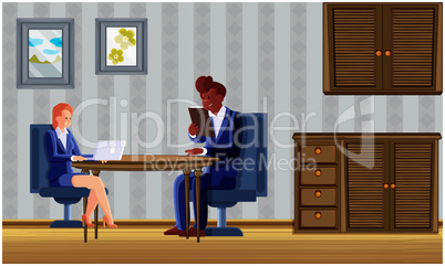 couple sitting in living room and using electronic devices