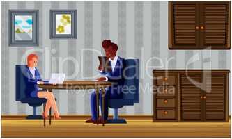 couple sitting in living room and using electronic devices