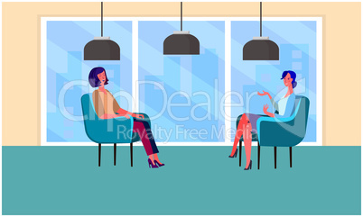 two females are sitting in office for business meeting