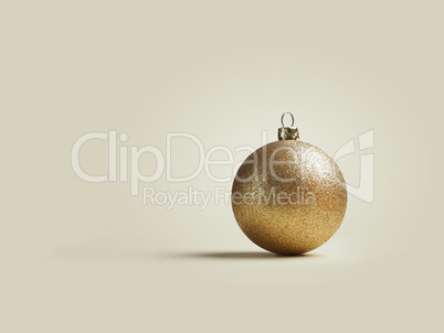 Christmas background with a single golden Christmas bauble