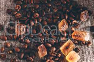 Roasted coffee beans and crystalline sugar