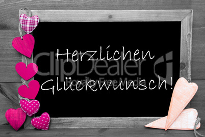 Balckboard With Pink Heart Decoration, Text Glueckwunsch Means Congratulations
