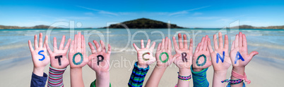 Children Hands Building Word Stop Corona, Ocean Background