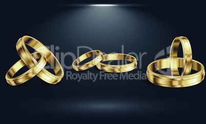 Couple Gold ring on the abstract dark background