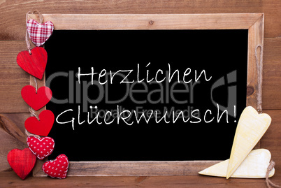 Balckboard With Heart Decoration, Text Glueckwunsch Means Congratulations