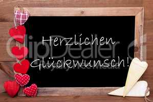 Balckboard With Heart Decoration, Text Glueckwunsch Means Congratulations