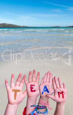 Children Hands Building Word Team, Ocean Background