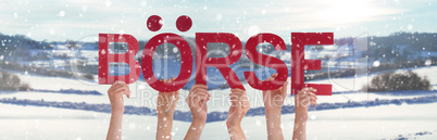 People Hands Holding Word Boerse Means Stock Market, Snowy Winter Background