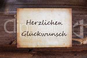 Old Paper, Glueckwunsch Means Congratulations, Wooden Background