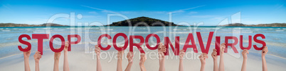 People Hands Holding Word Stop Coronavirus, Ocean Background