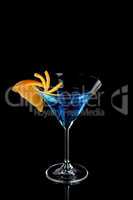 Orange decor Martini Blue Curacao on a black background